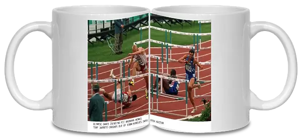 Tony Jarrett crashes out of the 110 Metre hurdles and into Erik Kaiser at the Olympic