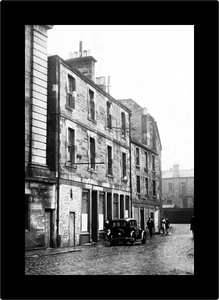 Mary of Guise house in Water St. of Broad Wyne. Leith, Edinburgh June 1947