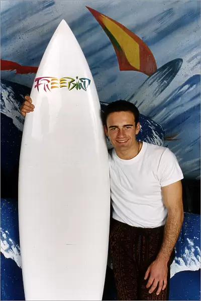 Julian McMahon, Australian actor, with surfboard