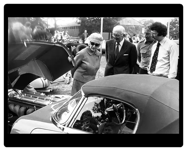Sir William Lyons, founder and chairman of Jaguar Cars and Lady Lyons look at an E-type