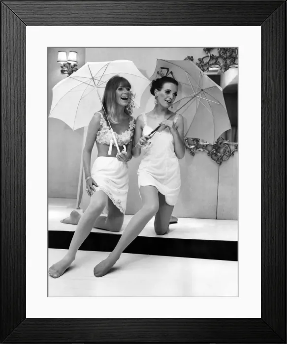Framed Print : A woman models a luxurious Antron jersey half-slip and non-run tights