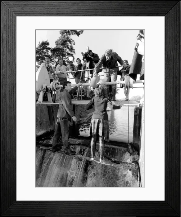 Framed Print : Black and white print of a television actress in a wet scene