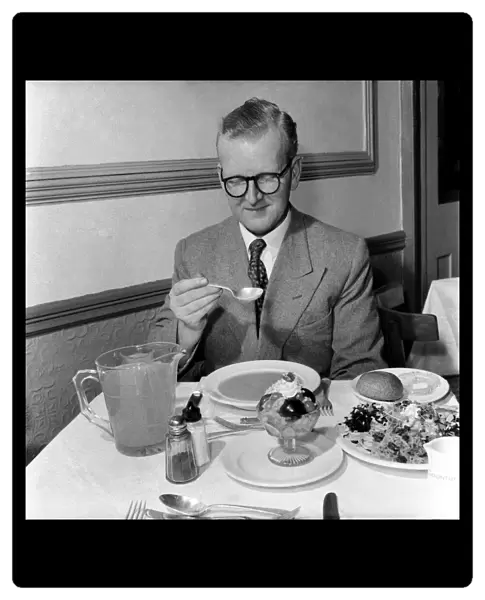 Food: Vegetarian: Mr. John Walton, eating the birthday lunch in the vegetarian restaurant