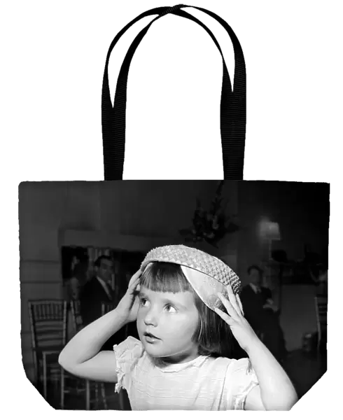 Clothing Hat Fashion: Child wearing a hat. July 1953 D3883