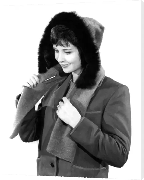 Model Ann Cave wearing a winter jacket with fur lined hood