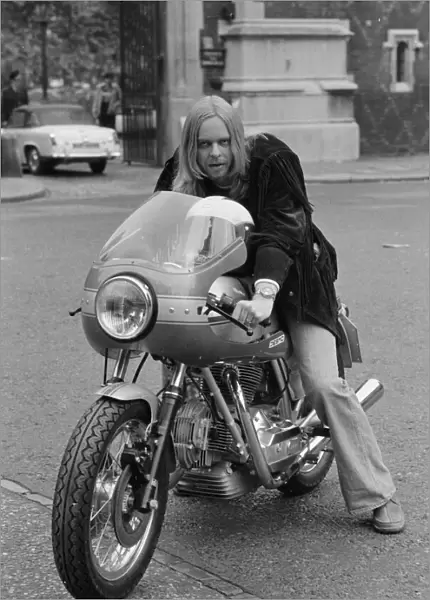 Yes keyboard player Rick Wakeman seen here riding a motorcycle