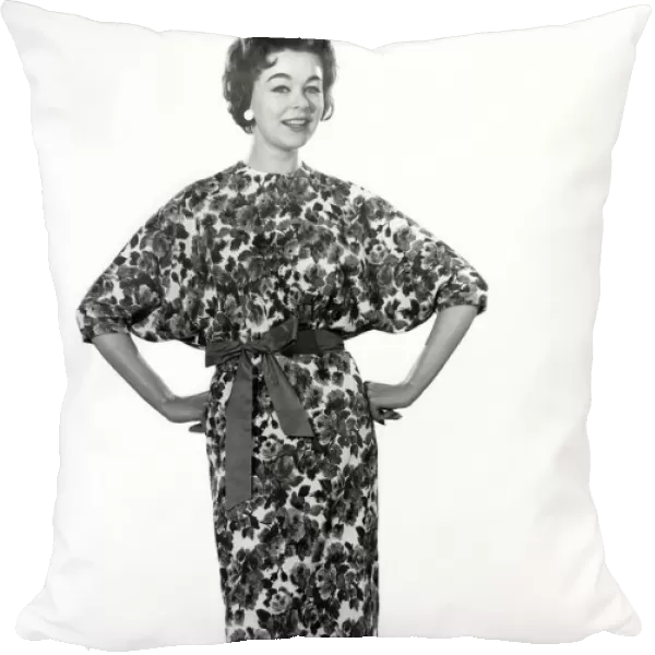 Model Jackie Jackson wearing floral patterned dress. September 1960 P008949
