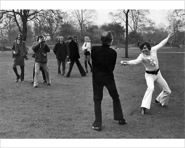 Actor-singer Jess Conrad challenged Actor Larry Taylor to a duel in Regents Park because