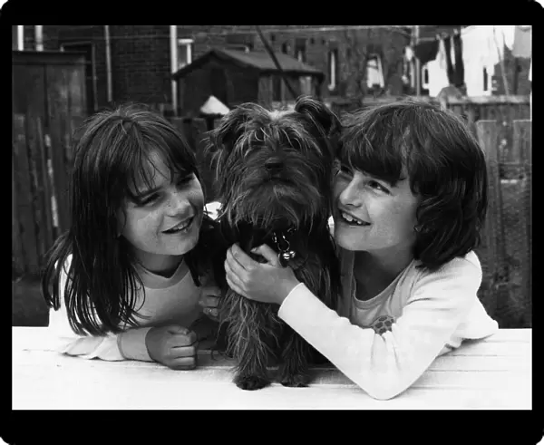 Family Pet. Pepe with Samantha (left) and Joanne Liddle. May 1983 P006086