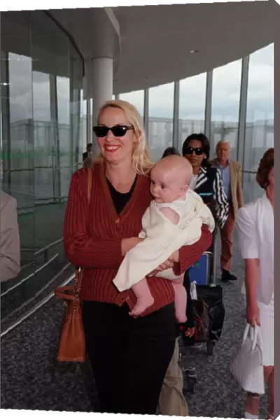 Jerry Hall Model June 98 Arriving at heathrow airport from Nice with her new baby