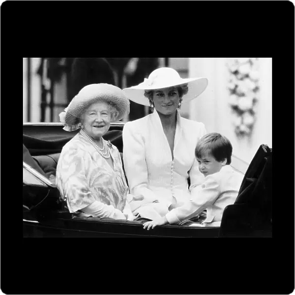 Queen Mother with Princess Diana and Prince William in an open carriage during