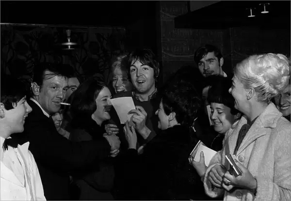Paul McCartney signs autographs at a hotel in Glasgow where he