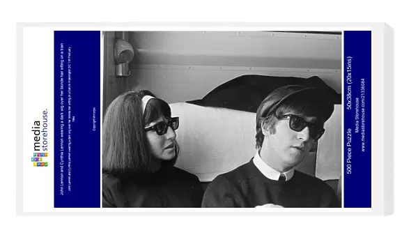 John Lennon and Cynthia Lennon wearing a dark wig over her blonde hair sitting on a train