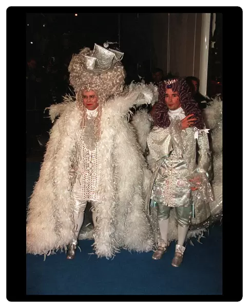 Elton John celebrates his 50th birthday at the Palais April 1997 dressed as Louis X1111