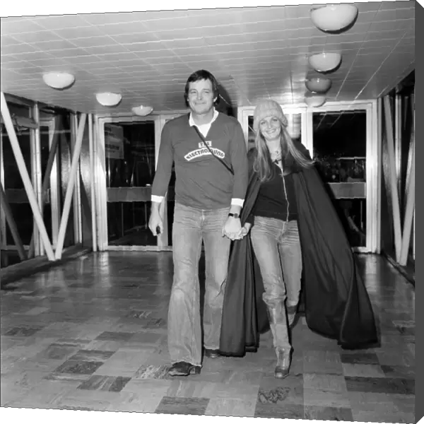 L. A. P. Twiggy. Model and singer Twiggy and boy friend Richard Whitney leaving London