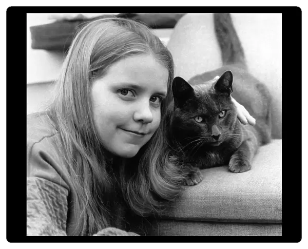 Dawn Herbdige and her cat. She says: 'Hes a little devil'