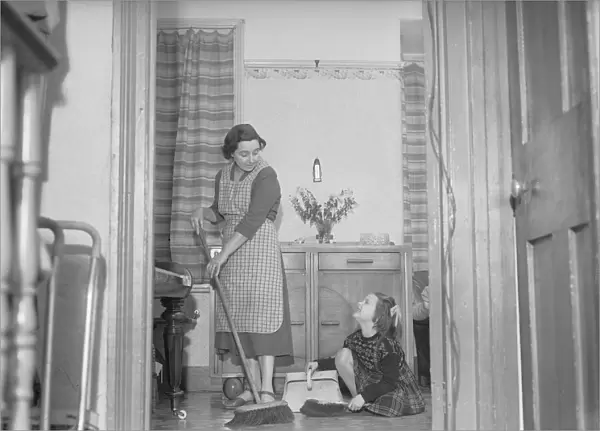 Stay at home mother Mrs Mary Mackenzie seen here bing helped in her household chores by
