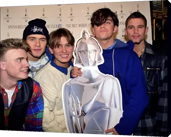 Pop group Take That at the Brit Awards. Left to right are: Gary Barlow, Howard Donald