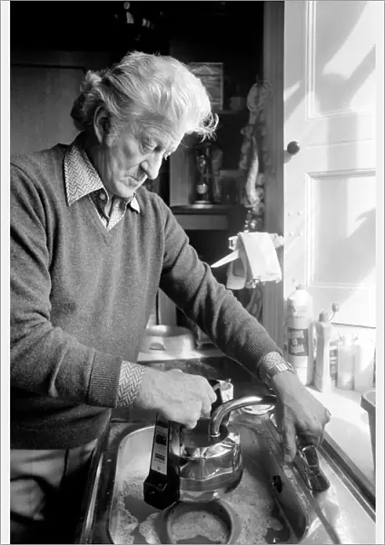 Actor John Pertwee seen here at home making tea. March 1981 PM 81-01203-001