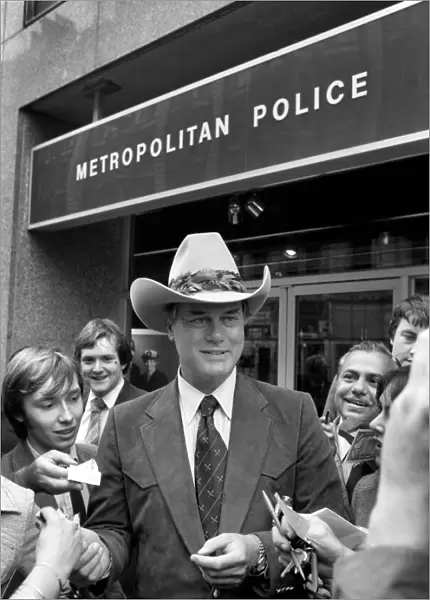 Actor Larry Hagman who plays J. R. Ewing in the programme Dallas seen here surrounded by