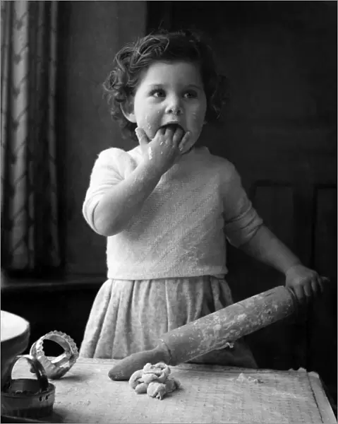 Mummy turned her back and baby realised her ambition. Mummy had made rolling pastry look