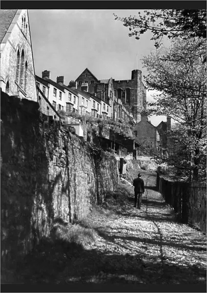 Man walking along the path by Bangor University. April 1949