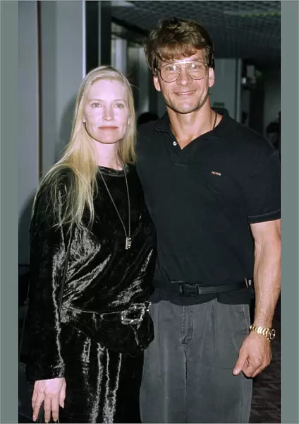 American actor Patrick Swayze with his wife Lisa on arrival at Heathrow Airport from Los