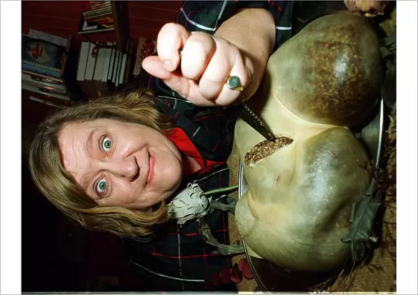 Clarissa Dickson Wright from Two Fat Ladies TV programme gets stuck into Haggis