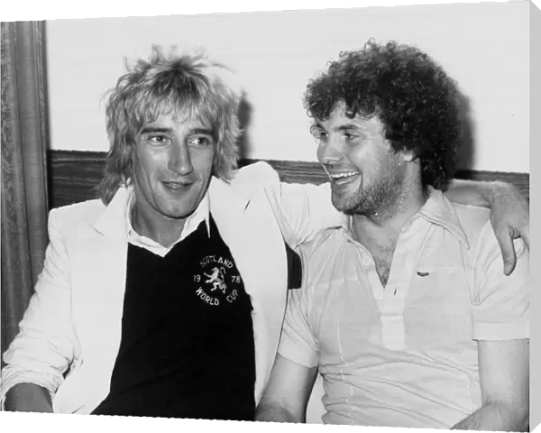 Rod Stewart with striker Derek Johnstone. The pop superstar called in on the Scottish