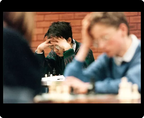 Children playing in a chess compeition in 1996