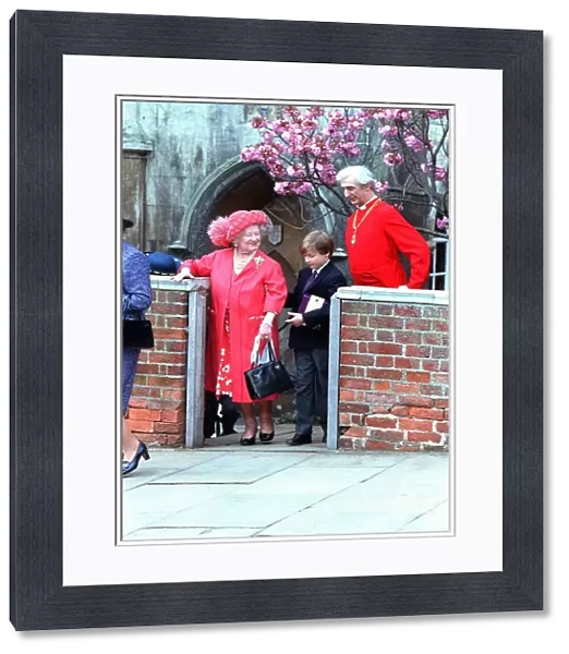 Queen Elizabeth, the Queen Mother, being helped by her great-grandson Prince William