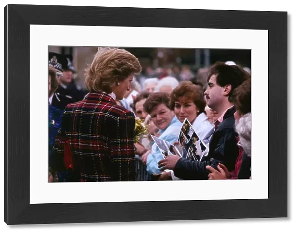Princess Diana talking to crowds on a walkabout during a visit to Prestwick, Scotland