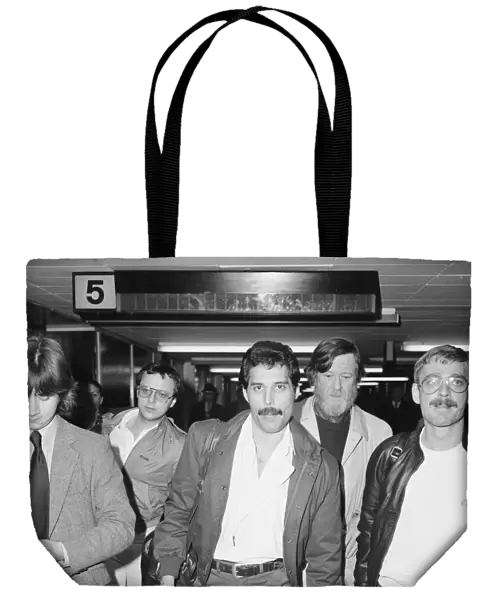 Lead singer with the pop group Queen Freddie Mercury seen here arriving at Heathrow