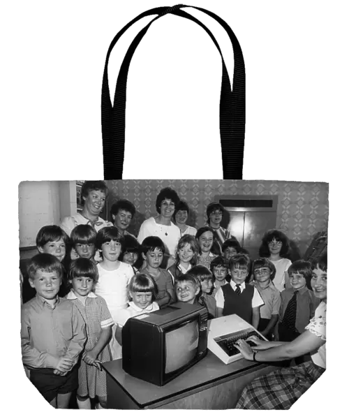 Children using computers. Pupils at Cramlingtons Crawhall First School were given
