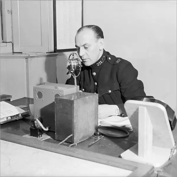 Radio and telegraph officer on duty in Scotland Yards information room
