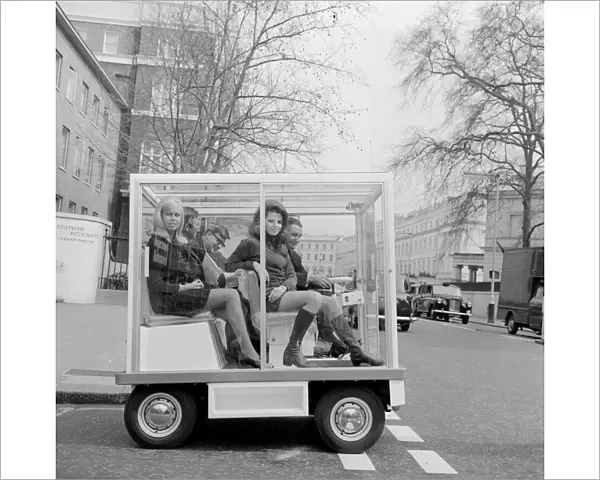 Jenny Hopkirk with her friend Sue Winchester (right) as they are driven around