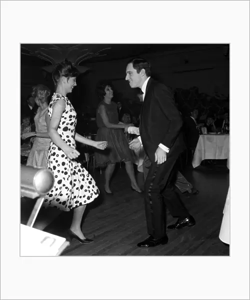Dances The Twist. Anthony Newley and Alma Cogan in the background dancing at The Hungaria