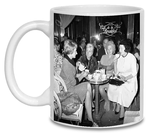 Joy Miller, wife British singer and actor Gary Miller seen here drinking tea in cafe