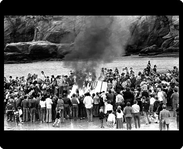 Models of Viking longships are burnt on the beach at Cullercoats Bay in July 1980