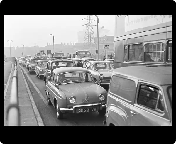 Traffic in Dagenham as the Ford factory turns out at the end of the day shift