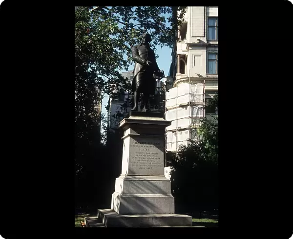 Statue of Robert Raikes in Embankment gardens London