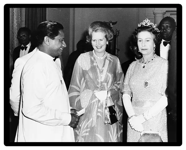 Prime Minister Margaret Thatcher meets the Queen at party given by Her Majesty for