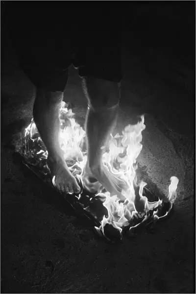 Fire walking feature. Frank Pepper walking through fire. 2nd January 1964