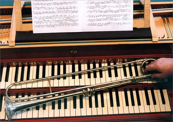 A seventeenth century trumpet replica on the keyboard of a harpsichord
