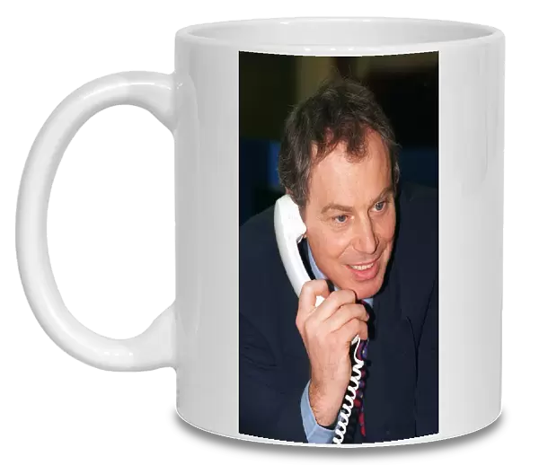 Tony Blair Prime Minister March 1998, speaks to caller during his visit to Heatwise