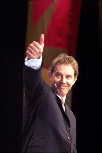 Tony Blair MP gives the thumbs up sign September 1999 after his speech to