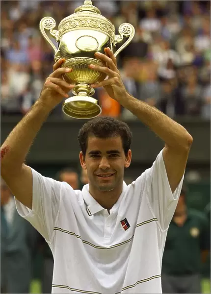 Pete Sampras lifts trophy after winning Wimbledon title 1999 against Andre Agassi in