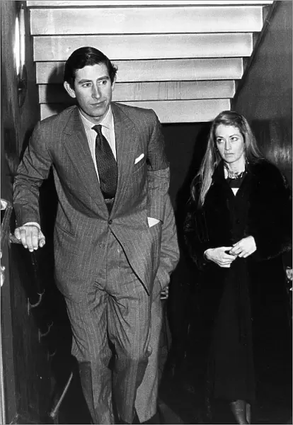 Prince Charles with friend Penelope Eastwood leaving a West End Theatre, March 1977