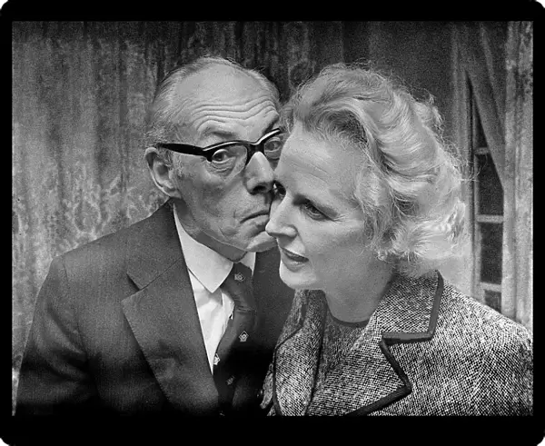 Margaret Thatcher with Denis Thatcher who kisses her on the cheek - February 1975
