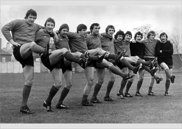 John Toshack leads the knees-up with (l-r) Jimmy Case, Steve Heighway, Emlyn Hughes
